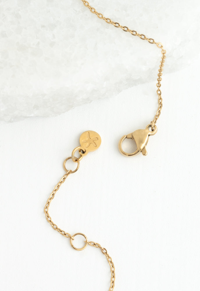 Radiant Cross Necklace in Gold