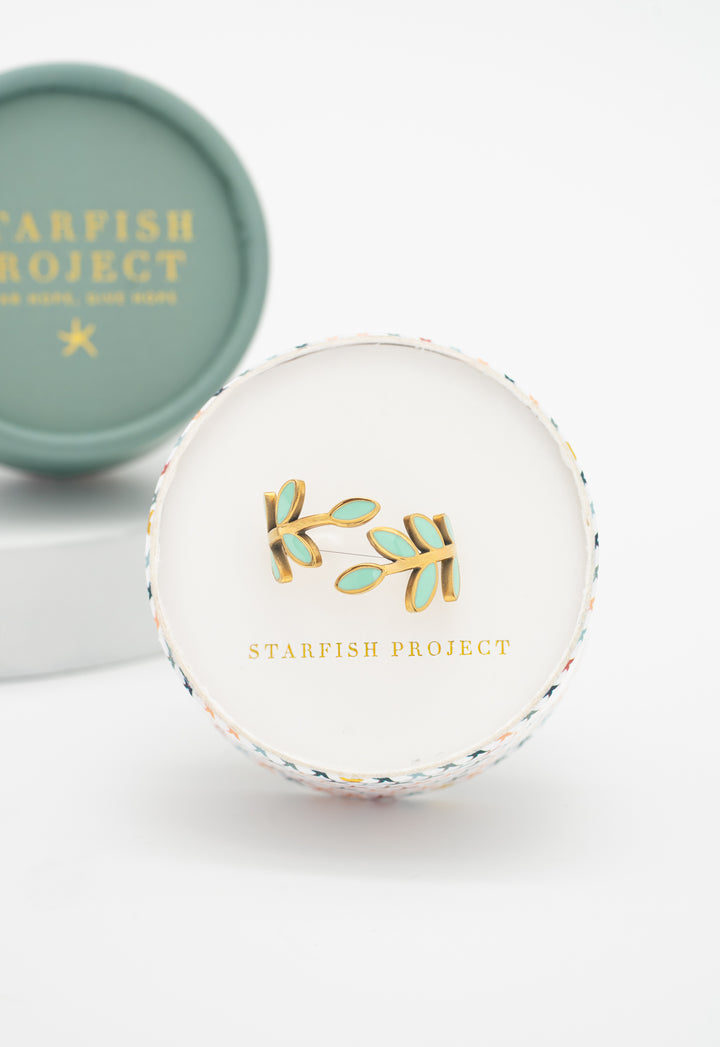 Seeds of Hope mint enamel and gold vine ring in a Starfish Project round gift box