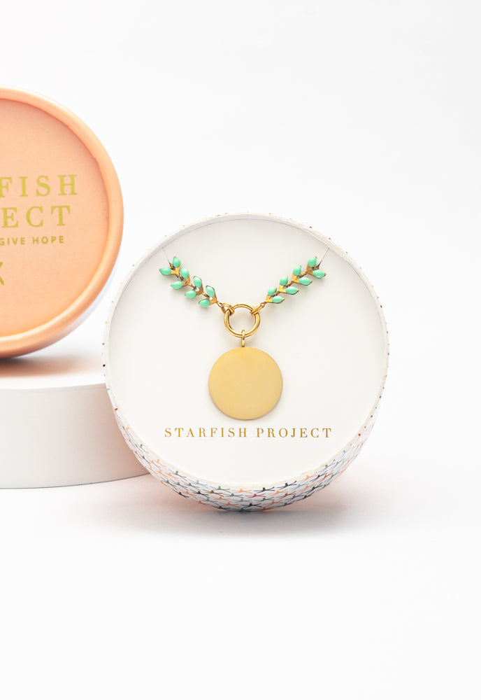 Engravable round pendant on mint Seeds of Hope chain in a Starfish Project round gift box